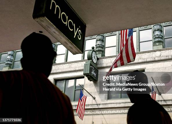 Filense Boston 7/29/05 - BOSTON, MA - A pedestrian walks past Macy's and Filene's in ...