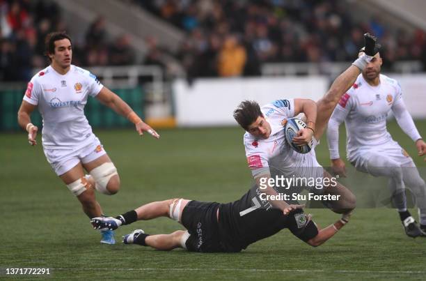 Falcons player Connor Collett tackles Tom Hendrickson of the Chiefs during the Gallagher Premiership Rugby match between Newcastle Falcons and Exeter...