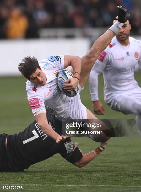 Falcons player Connor Collett tackles Tom Hendrickson of the Chiefs during the Gallagher Premiership Rugby match between Newcastle Falcons and Exeter...