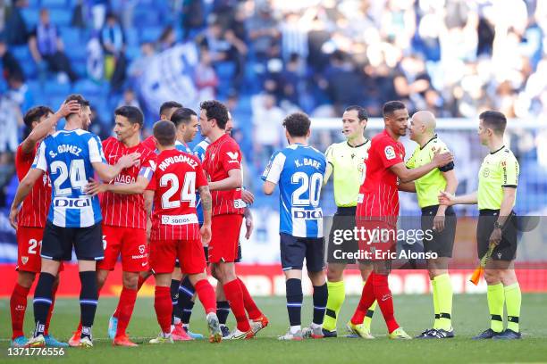 Players waves the referee after the LaLiga Santander match between RCD Espanyol and Sevilla FC at RCDE Stadium on February 20, 2022 in Barcelona,...