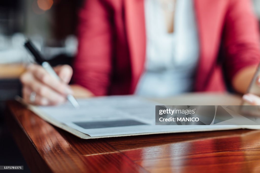 Document On A Table In A Cafe