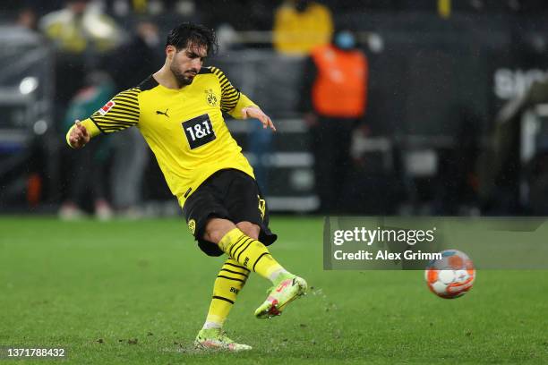 Emre Can of Borussia Dortmund scores their side's fifth goal from the penalty spot during the Bundesliga match between Borussia Dortmund and Borussia...