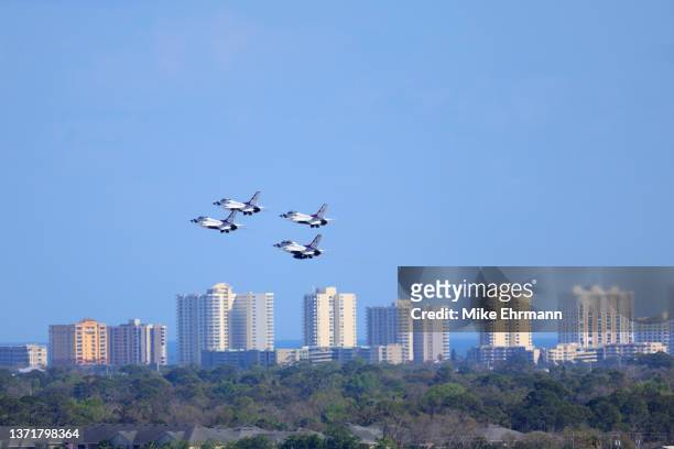 The U.S. Air Force Thunderbirds perform a flyover prior to the NASCAR Cup Series 64th Annual Daytona 500 at Daytona International Speedway on...