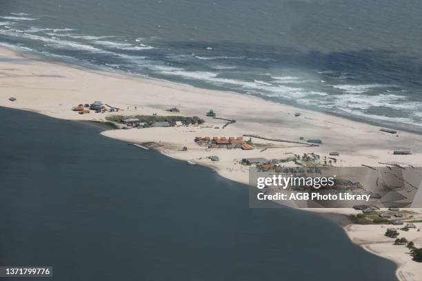 An aerial view of the City of Lencois Maranhense, Rio Preguicas, sea, Cabure, City, Barreirinhas, Maranhao, Brazil.