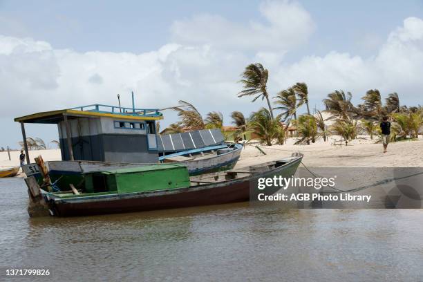 Boats on the beach in Rio Preguica, Cabure, Maranhao, Brazil.