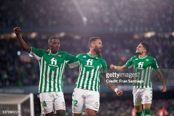 Willian Jose of Real Betis celebrates scoring their teams second goal with team mates during the LaLiga Santander match between Real Betis and RCD...