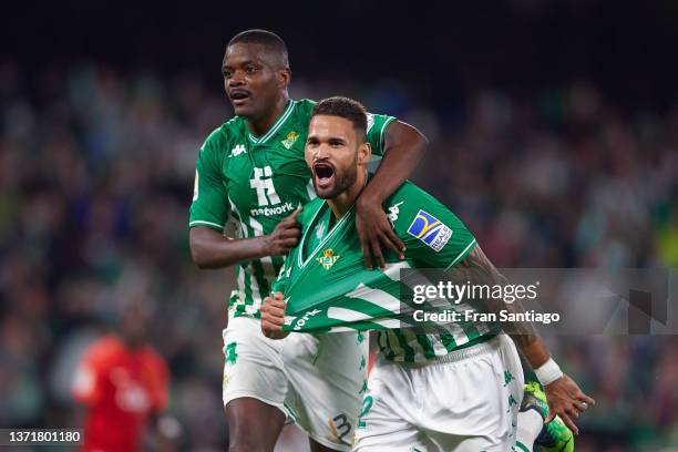 Willian Jose of Real Betis celebrates scoring their teams second goal with team mates during the LaLiga Santander match between Real Betis and RCD...