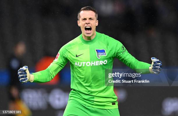 Alexander Schwolow of Hertha Berlin celebrates their first goal, scored by Stevan Jovetic during the Bundesliga match between Hertha BSC and RB...