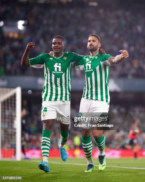 Willian Jose of Real Betis celebrates scoring their teams second goal with team mates during the LaLiga Santander match between Real Betis and RCD...
