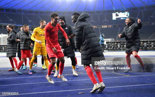 Tyler Adams and Christopher Nkunku of RB Leipzig celebrate after the Bundesliga match between Hertha BSC and RB Leipzig at Olympiastadion on February...