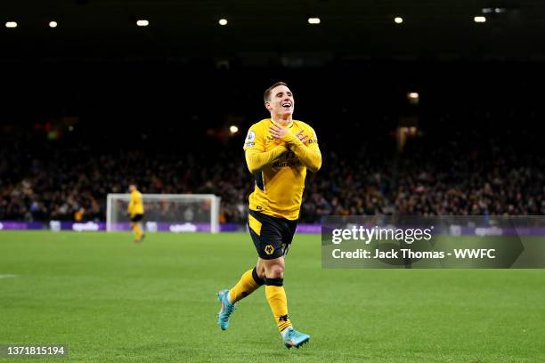 Daniel Podence of Wolverhampton Wanderers celebrates after scoring his team's second goal during the Premier League match between Wolverhampton...