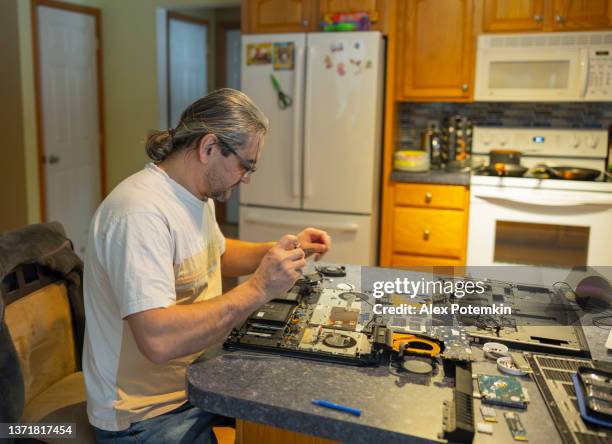 Taking Apart A Computer Photos and Premium High Res Pictures - Getty Images