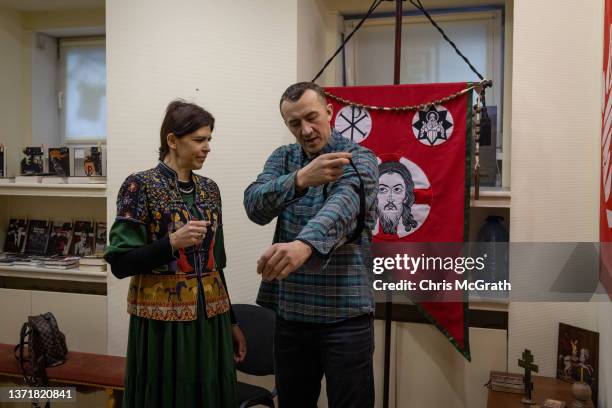 Civilians learn how to use a tourniquet during a medical training session held by "The Brotherhood" a Christian Territorial Defense unit on February...