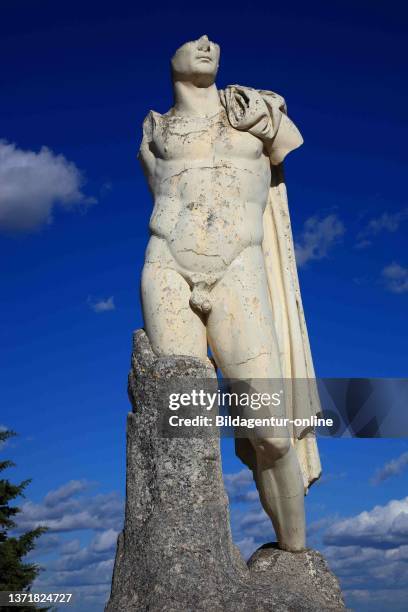 Spain, Andalusia, Seville Province, Santiponce, archaeological excavation site Italica, heroic sculpture of the Emperor Trajan.