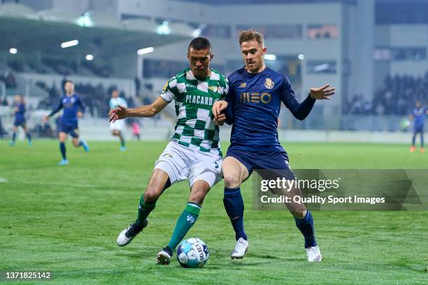 Toni Martinez of FC Porto competes for the ball with Pablo Santos of Moreirense FC during the Liga Portugal Bwin match between Moreirense FC and FC...