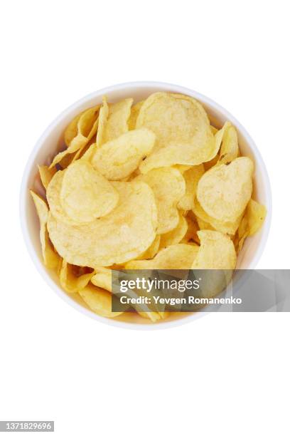 potato chips in a white bowl isolated on white background - patatas fritas de churrería fotografías e imágenes de stock