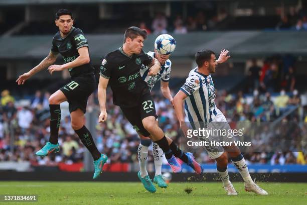Jorge Mere of America fights for the ball with Luis Chavez of Pachuca during the 6th round match between America and Pachuca as part of the Torneo...