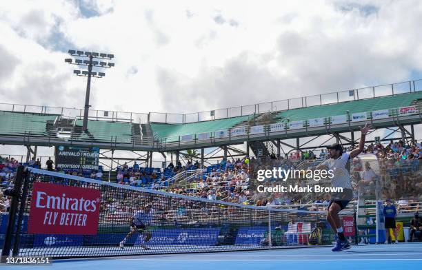 Aisam-Ul-Haq Qureshi of Pakistan returns a shot against Marcelo Arevalo of El Salvador and Jean-Julien Rojer of Netherlands in the Doubles Finals in...