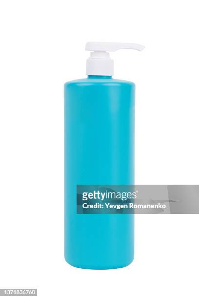 blue cosmetic bottle, isolated on white background - shampoo bottle white background stock pictures, royalty-free photos & images