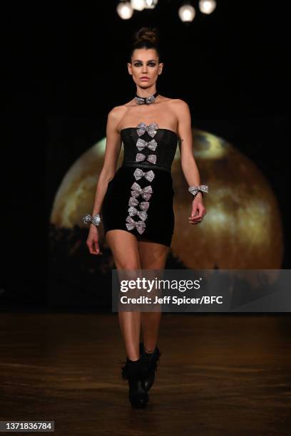 Model walks the runway at the AADNEVIK Show during London Fashion Week February 2022 on February 20, 2022 in London, England.