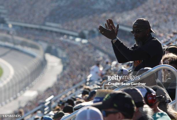 Fan cheers during the NASCAR Cup Series 64th Annual Daytona 500 at Daytona International Speedway on February 20, 2022 in Daytona Beach, Florida.