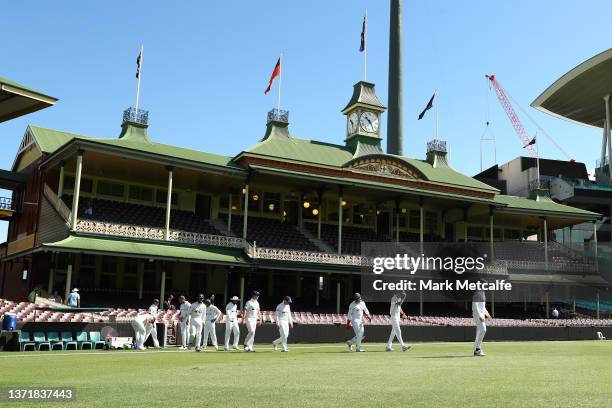 The Blues walk out to field during day four of the Sheffield Shield match between New South Wales and Tasmania at Sydney Cricket Ground, on February...