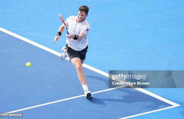 Cameron Norrie of Great Britain returns a shot against Reilly Opelka of the United States during the Finals of the Delray Beach Open by Vitacost.com...