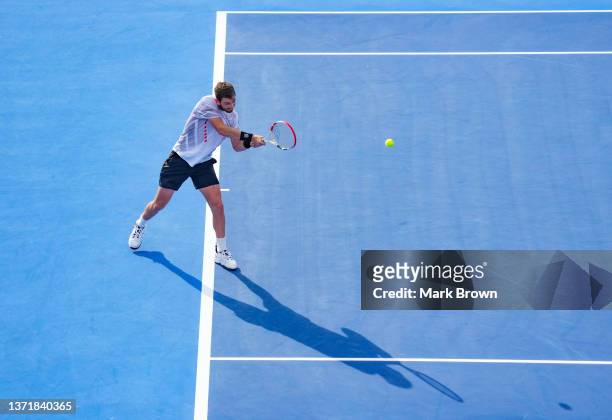 Cameron Norrie of Great Britain returns a shot against Reilly Opelka of the United States during the Finals of the Delray Beach Open by Vitacost.com...