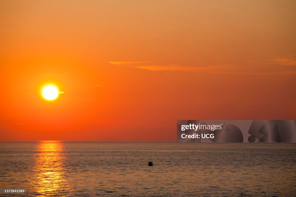 Sunset. Promenade. Reggio Calabria. Calabria. Italy. Europe Tramonto. Lugomare. Reggio Calabria. Calabria. Italia. Europa.