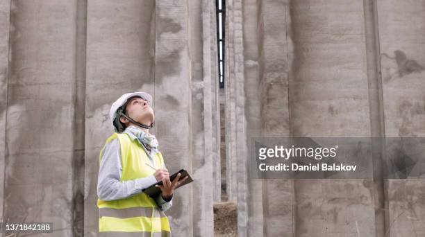 female road engineer working. building new highways. - motorway roadworks stock pictures, royalty-free photos & images