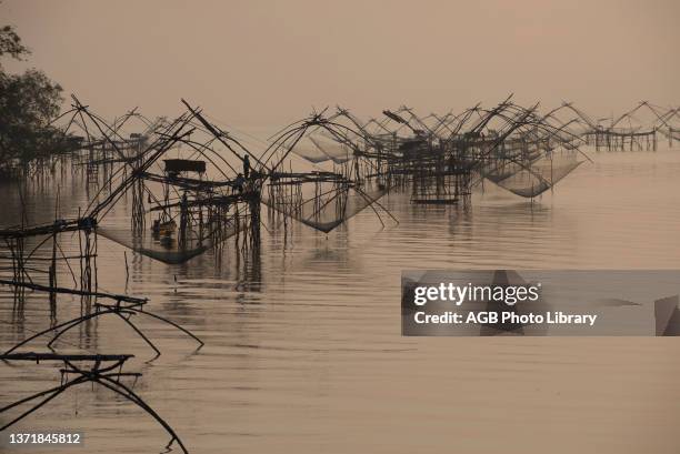 Thailand, Phatthalung, Shore-operated lift net, Sunrise.