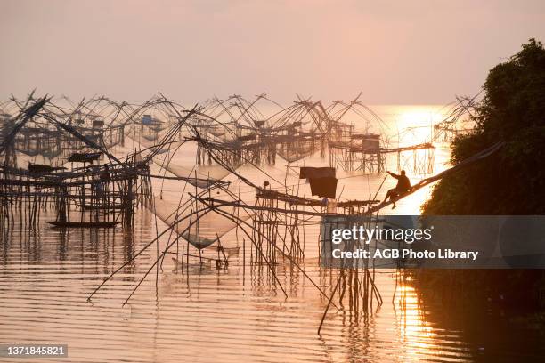 Thailand, Phatthalung, Shore-operated lift net, Sunrise.