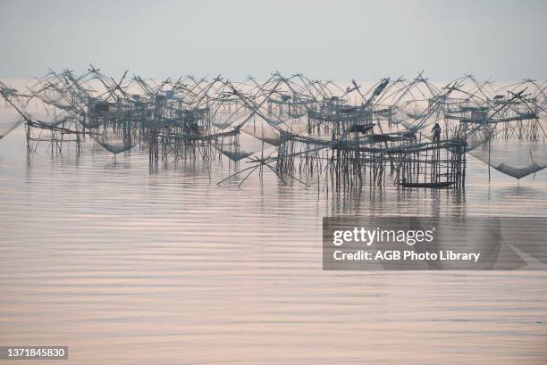 Thailand, Phatthalung, Shore-operated lift net, Sunrise.