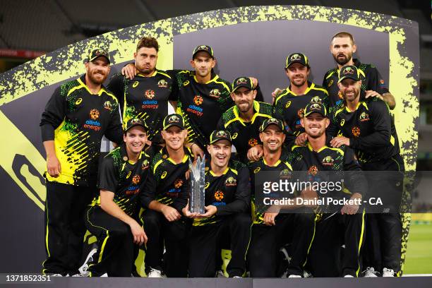 Australia pose with the trophy after game five of the T20 International Series between Australia and Sri Lanka at Melbourne Cricket Ground on...