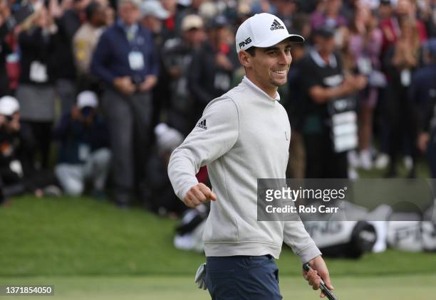 Joaquín Niemann of Chile celebrates after putting on the 18th green to win during the final round of The Genesis Invitational at Riviera Country Club...