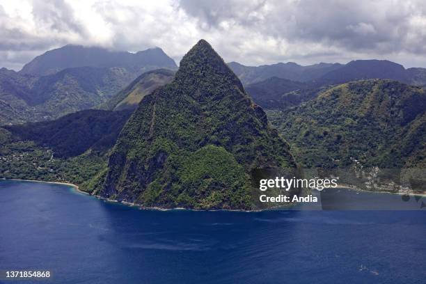 Caribbean, Saint Lucia: aerial view of the coast and the mountainous volcanic plug Petit Piton, volcano of the Soufriere Volcanic Center or Qualibou.