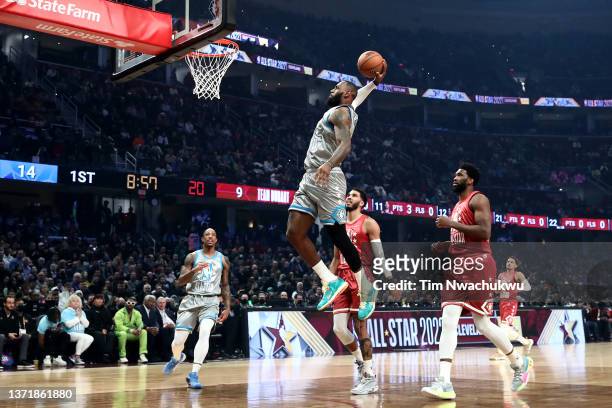 LeBron James of Team LeBron dunks the ball in the first half during the 2022 NBA All-Star Game at Rocket Mortgage Fieldhouse on February 20, 2022 in...