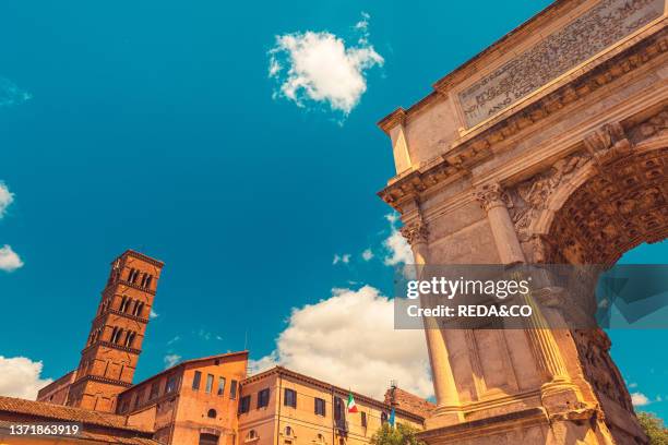 The Arch of Titus and the Church in the Square of Santa Maria Nova. Rome. Italy. Europe.