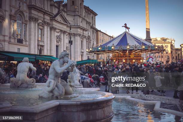 Ancient German Horse Carousel built in 1896 in Navona Square. Rome. Italy.