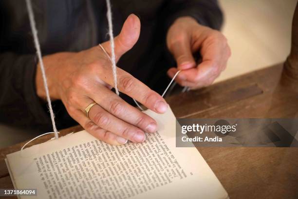 Threadbind Book 27 Thread Book Binding Stock Photos, High-Res Pictures, and Images ...