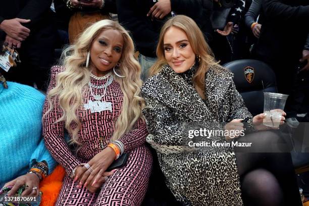Mary J. Blige and Adele attend the 2022 NBA All-Star Game at Rocket Mortgage Fieldhouse on February 20, 2022 in Cleveland, Ohio. NOTE TO USER: User...
