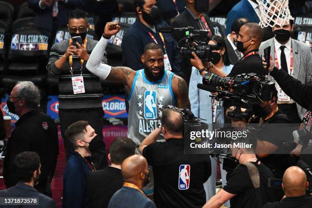 LeBron James of Team LeBron celebrates after defeating Team Durant 163-160 in the 2022 NBA All-Star Game at Rocket Mortgage Fieldhouse on February...