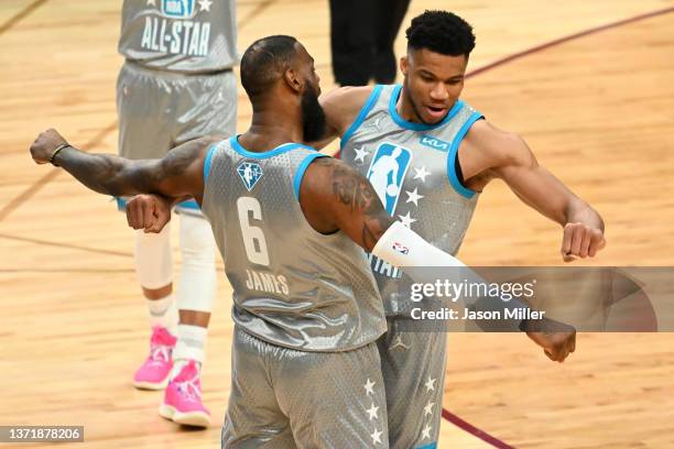 LeBron James and Giannis Antetokounmpo of Team LeBron celebrate after defeating Team Durant 163-160 in during the 2022 NBA All-Star Game at Rocket...