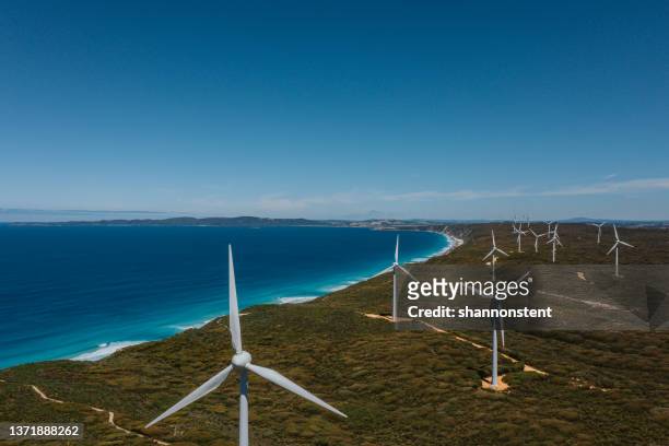 wind farm by the sea - wind turbine aerial stock pictures, royalty-free photos & images