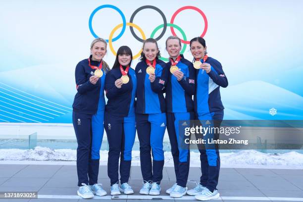 Curlers Milli Smith, Hailey Duff, Jennifer Dodds, Vicky Wright and Eve Muirhead of Team Great Britain pose for pictures with their gold medals after...