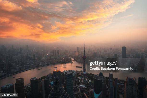 shanghai city scene from world financial center tower - huangpu fluss stock-fotos und bilder