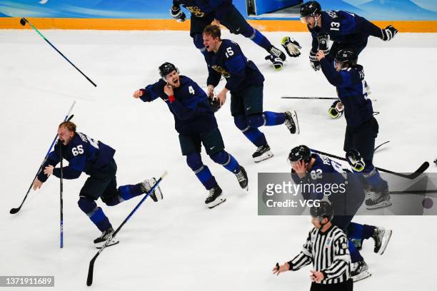 Players of Team Finland celebrate winning the Gold medal at final whistle following the Gold Medal game between Team Finland and Team ROC on Day 16...
