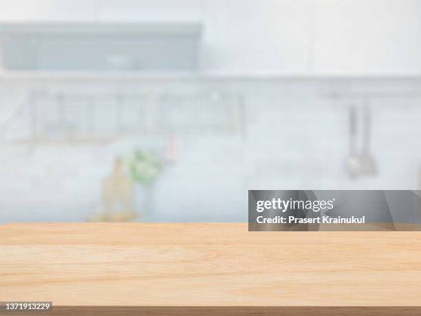 empty wood tabletop in kitchen. concept for montage your text or product - キッチン ストックフォトと画像