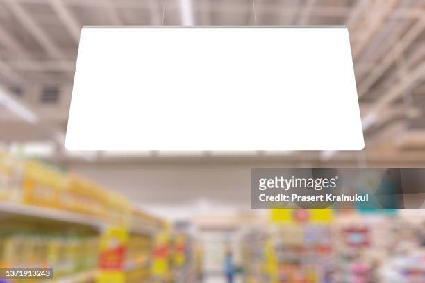 blank advertising billboard hanging in the supermarket - suspended ceiling stock pictures, royalty-free photos & images