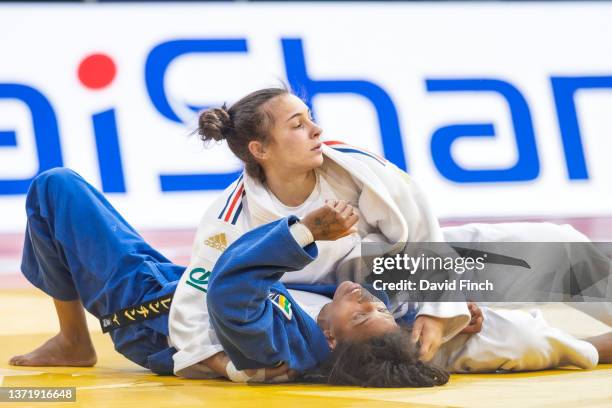 Junior World medallist and triple junior European champion, Faiza Mokdar of France releases her hold after controlling Olympic and World champion...